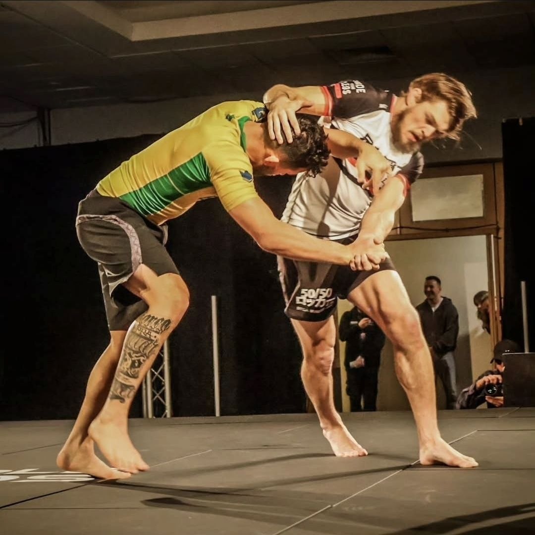 Jack Tyley competing in a no-gi grappling match